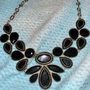 Black and gold costume jewelry necklace